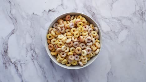 bowl of colorful ring cereal