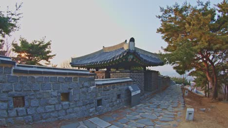 Asian-Korean-Hwaseong-fortress-rock-stone-wall-and-ladder-in-Suwon,-traditional-culture-architecture-object-UNESCO-heritage-wide-angle-view