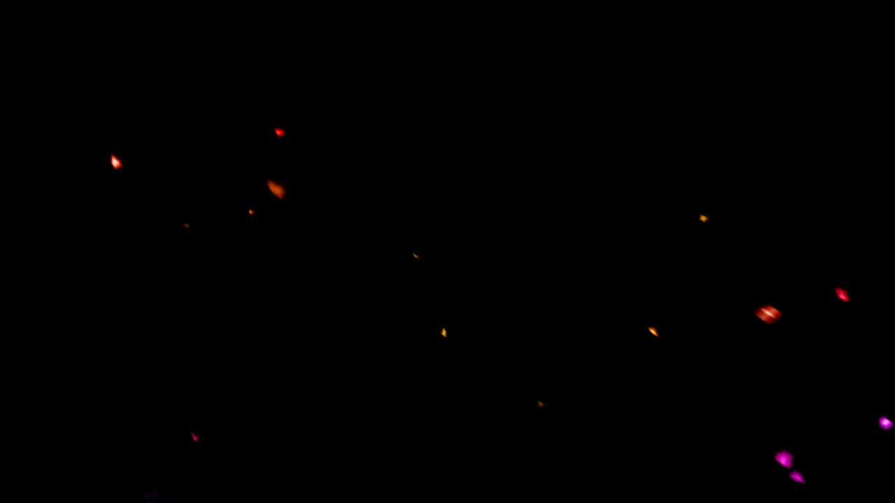 el brillo digital de navidad enciende partículas de varios colores el bokeh fluye desde arriba sobre un fondo negro, fiesta festiva feliz evento de año nuevo