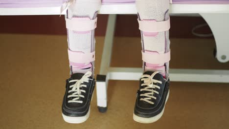 close-up of a child's legs in a cast