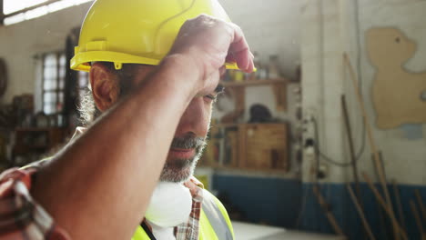 carpenter wearing hard hat