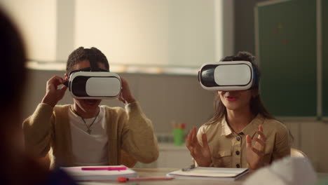 students in vr glasses learning in school. children immersing in virtual reality