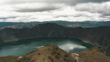 landscape of the quilotoa volcanic lake in ecuador - aerial shot