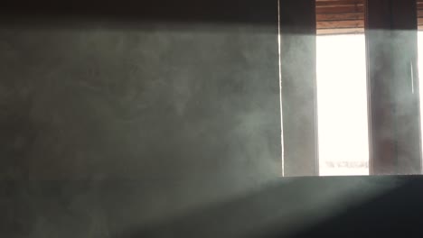 Smoke-in-a-dark-room-in-slow-motion