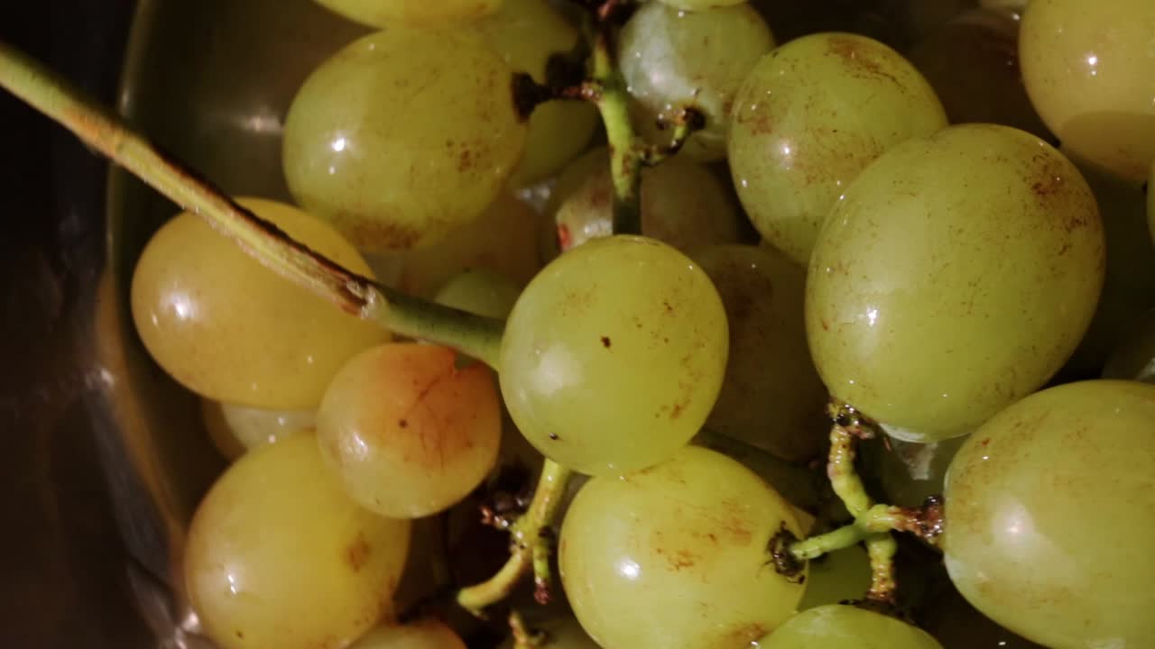 White grape in a rotating metal plate