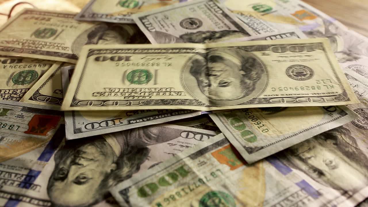 Lot Of One Hundred Of Dollar Bills. One hundred dollars pile as background