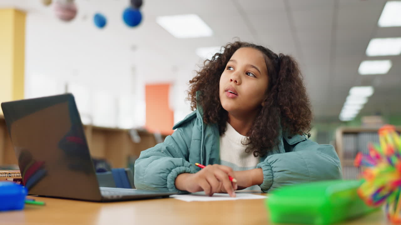 A girl studying in the library