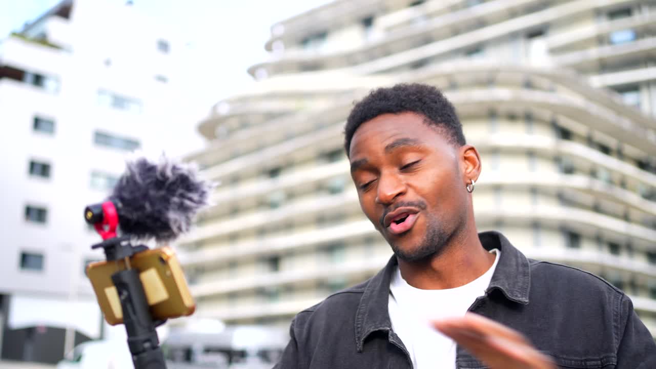 Man vlogging in an urban environment