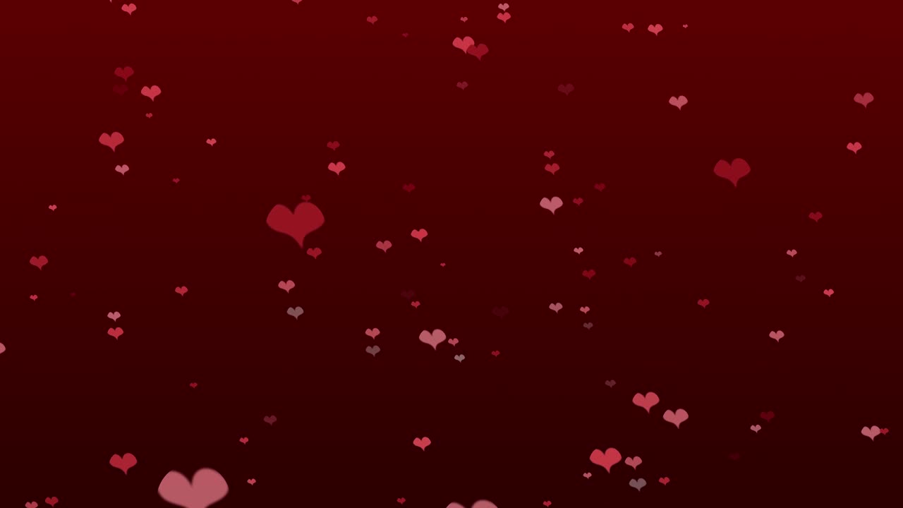 Loop continuo di bokeh con icona a cuore su sfondo rosso per contenuti di festival natalizi o della stagione invernale, o per sfondi, contenuti sull'inverno, contenuti d'amore o San Valentino.