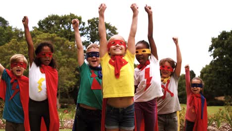 group of kids pretending to be a super hero