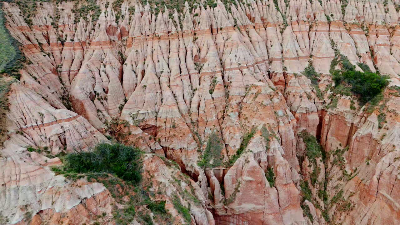 Stunning aerial view of Râpa Roșie, showcasing unique red formations