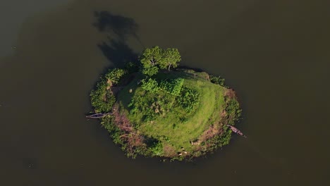 small islet in middle of surma river in sylhet traditional asian boats, aerial