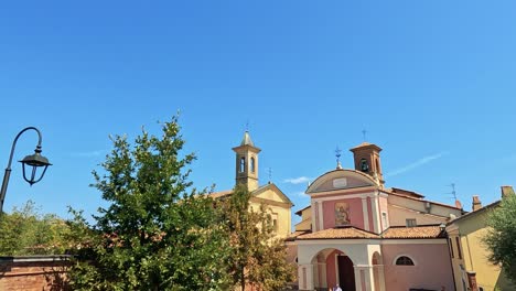 church and trees under a clear blue sky