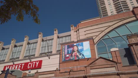 shot from outside famous paddy's market, fruits, vegies and souvenir market at market city in sydney cbd, australia