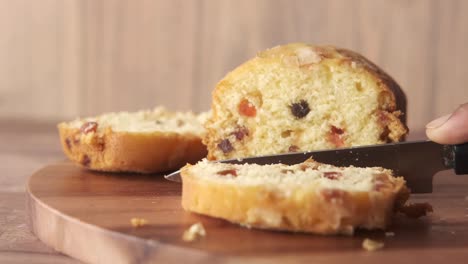 slicing a homemade fruitcake