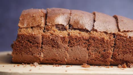 sliced loaf cake on wooden board