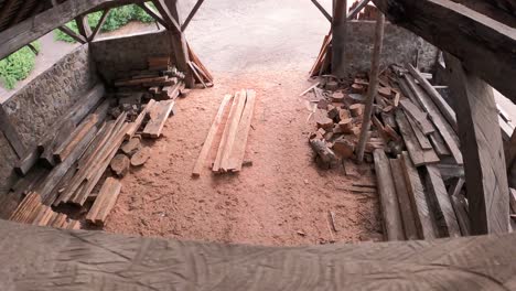 Lateral-travelling-top-view-old-wooden-sawmill-shack-in-nature