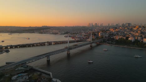 4k cinematic drone footage golden hour at haliç altin boynu bridge in istanbul - turkey_03