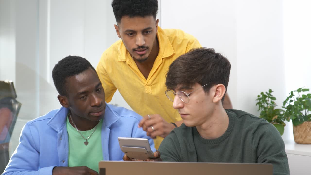 Startup founders discussing finances and planning business strategy