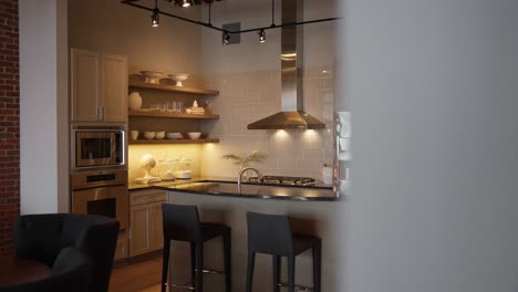 panning revealing shot of a modern kitchen with grey finishes