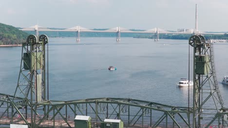 aerial telephoto rising shot of the vertical life bridge and st. croix crossing in stillwater, minnesota. 4k