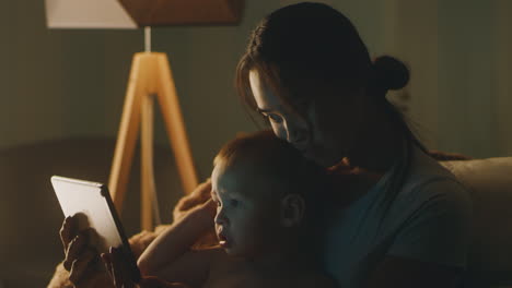 mother and child enjoying a nighttime storytime
