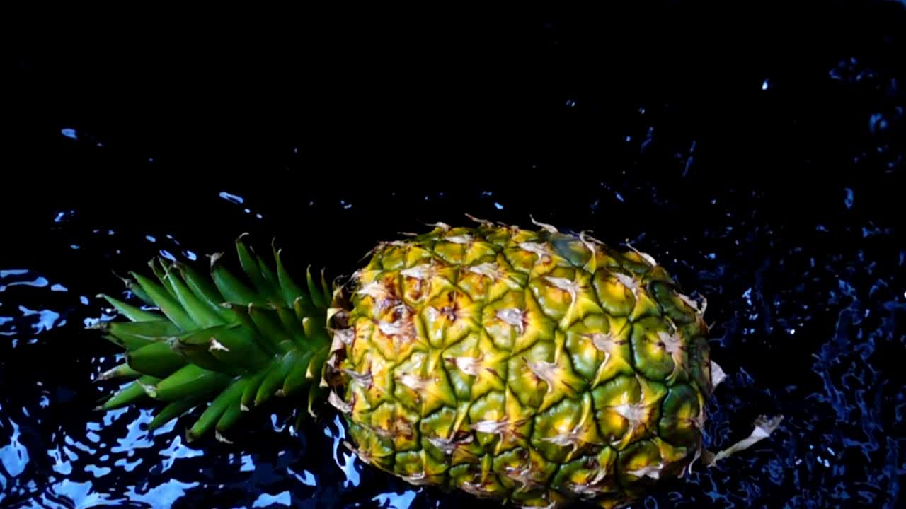 Falling of pineapple. Slow motion