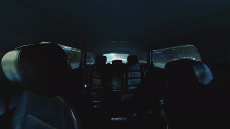 Time-Lapse-Footage-of-Light-Trails-Behind-the-Window-of-a-Driving-Car-at-Night