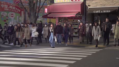 crowd crossing the road in tokyo