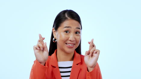 asian woman, cross fingers and studio with hope