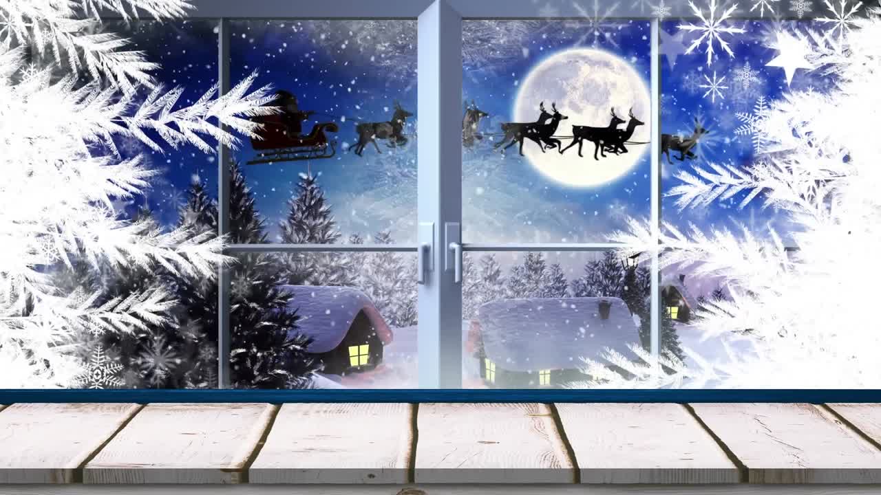 산타클로스의 애니메이션과 창문을 통해 볼 수 있는 겨울 풍경