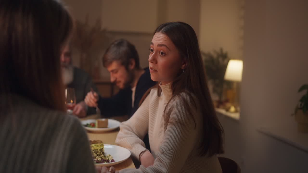 People having dinner at a table