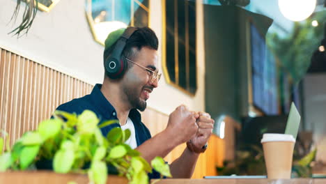 Laptop,-coffee-shop-and-happy-man-celebrate