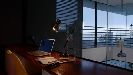 laptop, notebook, and smartphone on desk in modern home office setup, copy space