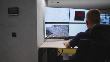 security guards monitoring modern cctv cameras in surveillance room