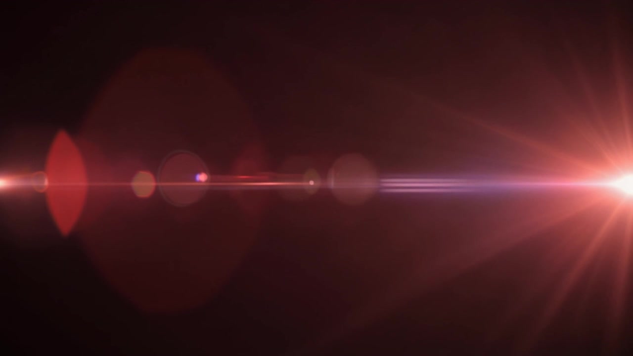 Effetto flare rosso su sfondo scuro