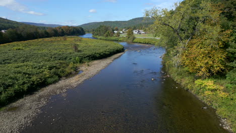 mohawk trail by deerfield river in western massachusetts new england usa, slow aerial dolly up river
