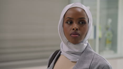 Pretty-black-woman-with-hijab-in-modern-shopping-mall