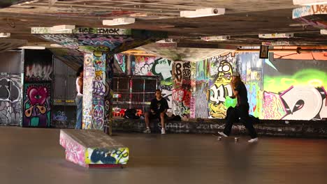 skateboarders practicing tricks in vibrant urban setting