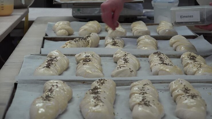 A bakery also baker's shop or bake shop is an establishment that produces and sells flour-based food baked in an oven such as bread, cookies, cakes, pastries, and pies
