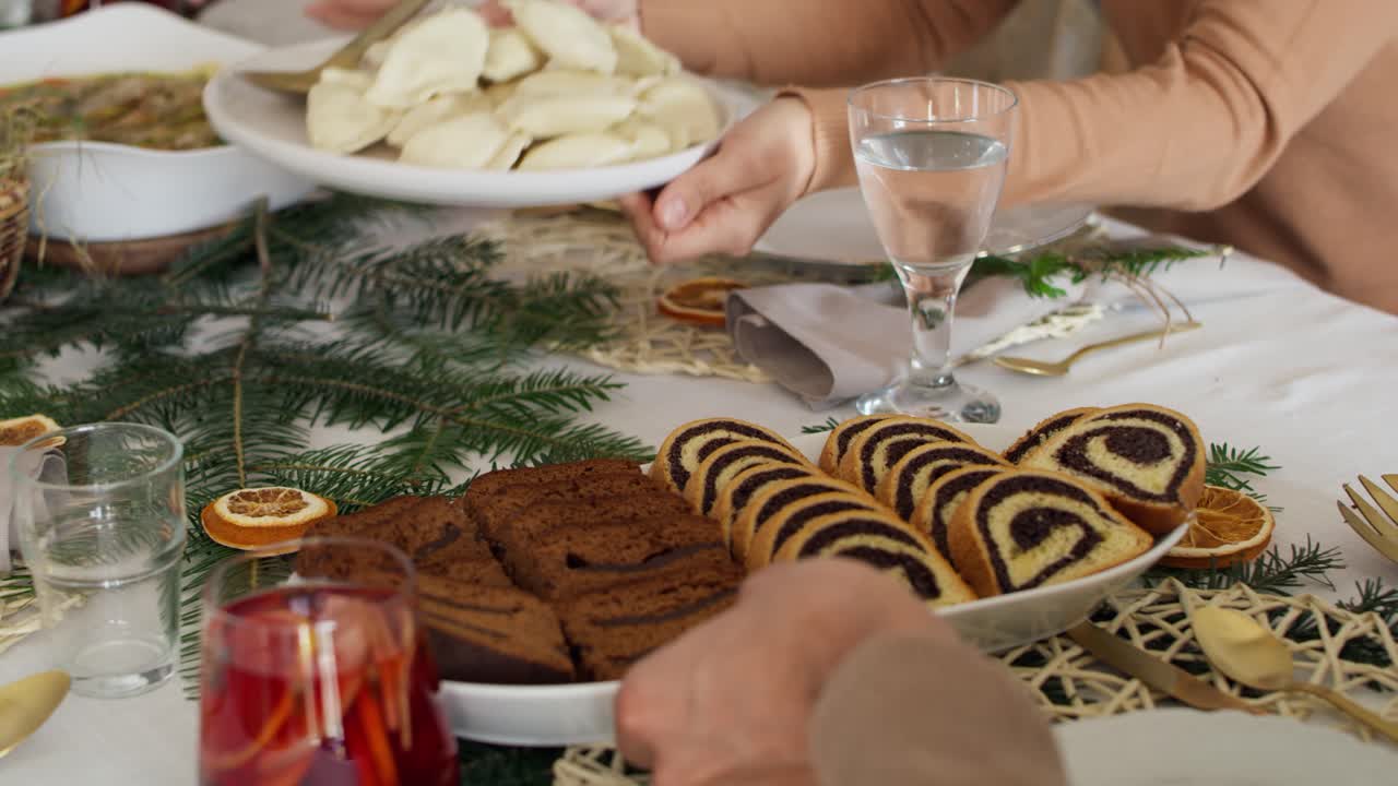 Family sharing the traditional Polish cake