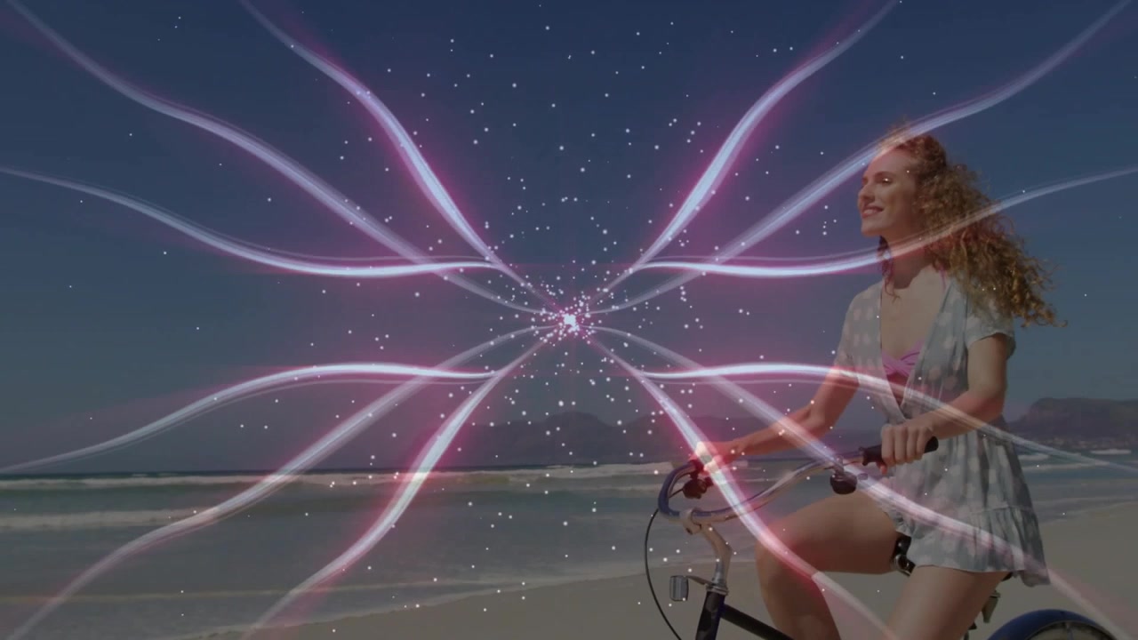 Donna che pedala una bici cruiser su una spiaggia sabbiosa, con un bagliore radiale rosa-bianco che inizia e pulsa per il viaggio.