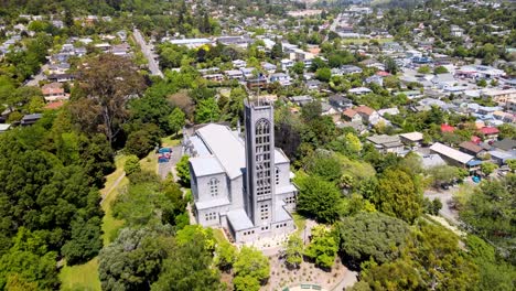 beautiful aerial of iconic christ church cathedral and nelson city downtown, summer sunny day in new zealand