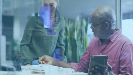 Animation-of-multiple-graphs-and-computer-language,-diverse-coworkers-discussing-on-desk