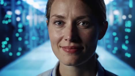 a thoughtful moment in a data center: a close-up of a professional with a contemplative expression amidst a background of illuminated server racks and digital interaction