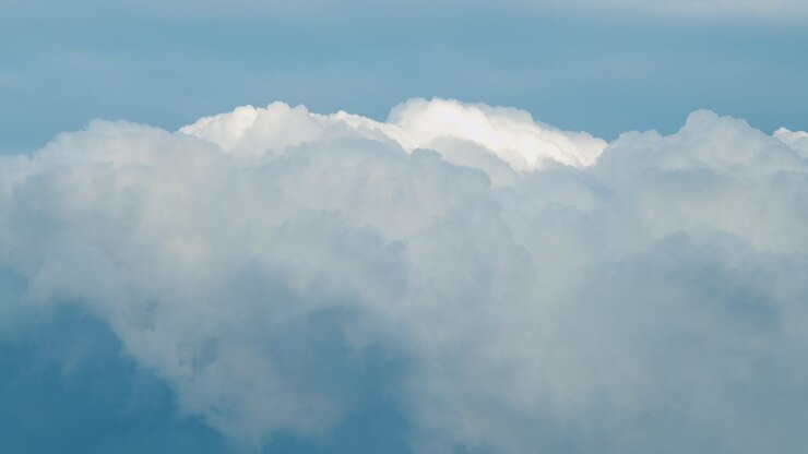 Rain clouds cumulus stratocumulus time lapse over countryside fields