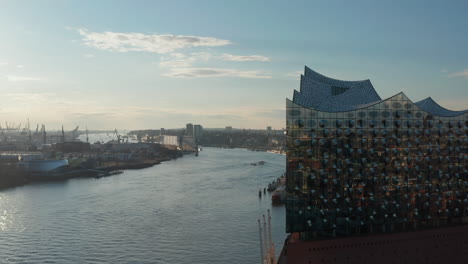 Aerial-view-of-Elbphilharmonie-and-Speicherstadt-warehouses-by-the-river-Elbe-in-Hamburg,-Germany