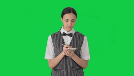 Indian-woman-waiter-taking-orders-Green-screen