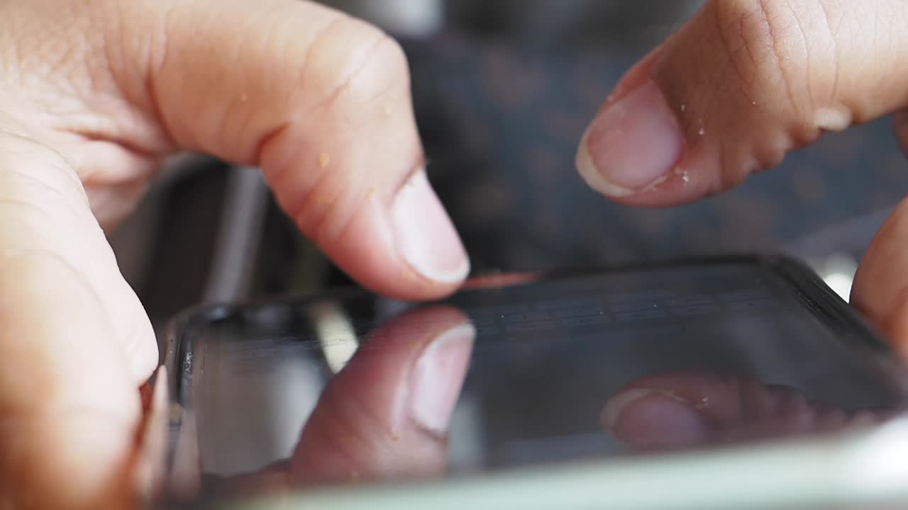 Hands Using a Smartphone