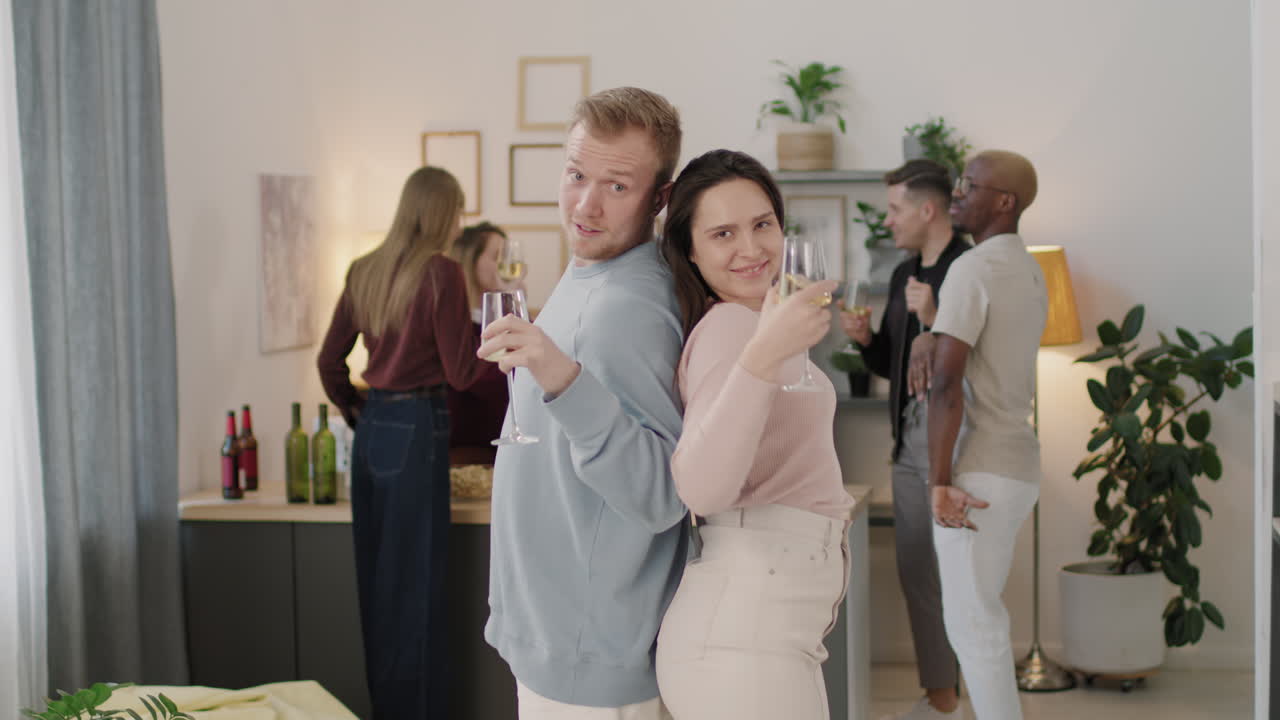 Man and Woman Having Fun at House Party